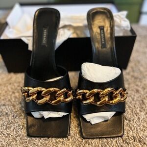 Versace Black Mules with Gold Chain Detail